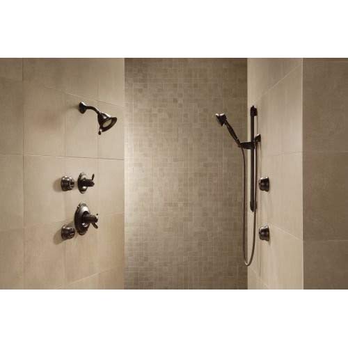 Delta matte-black wall elbow showing hose-ready outlet for handheld showers