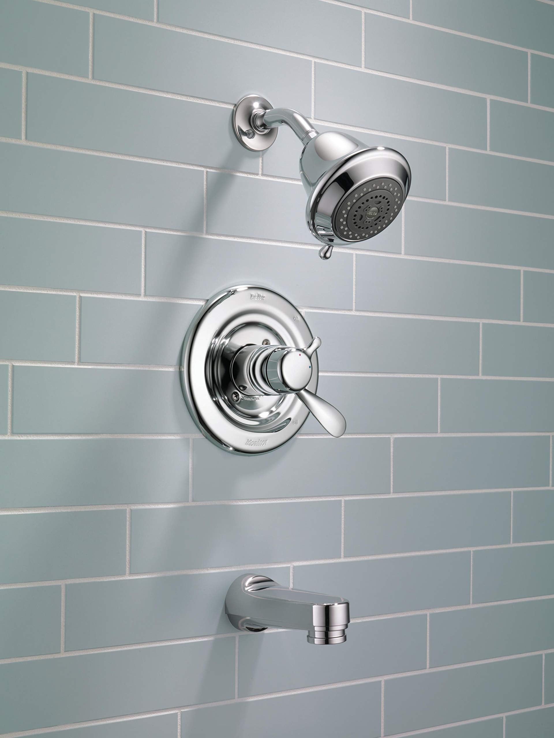 Delta RP17453 chrome tub spout with pull-down divert for flexible water control.