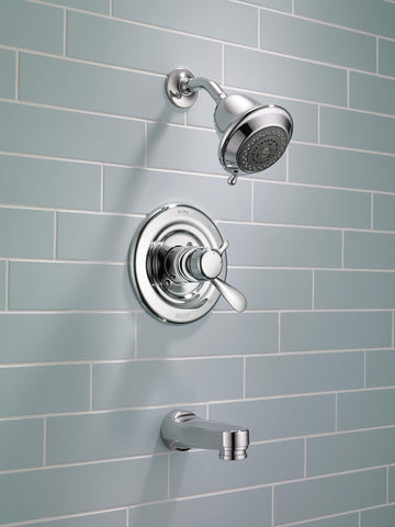 Delta RP17453 chrome tub spout with pull-down divert for flexible water control.