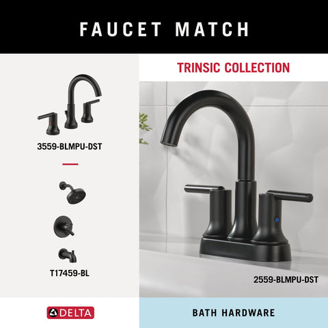 Bathroom scene featuring Trinsic holder coordinating with matte black accents