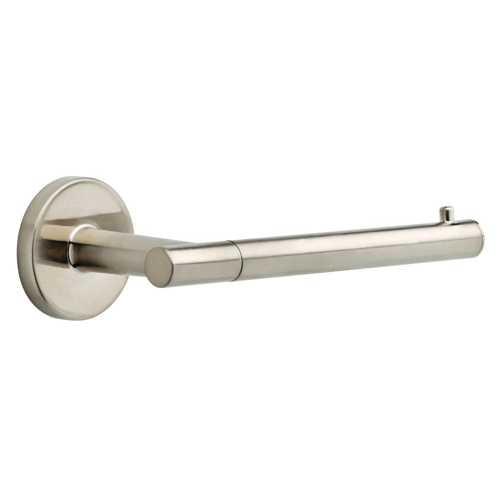 Delta Trinsic toilet paper holder in brushed stainless steel, wall-mounted for a clean, space-saving bathroom.
