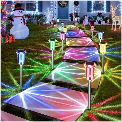 DenicMic lights illuminating a yard path at dusk