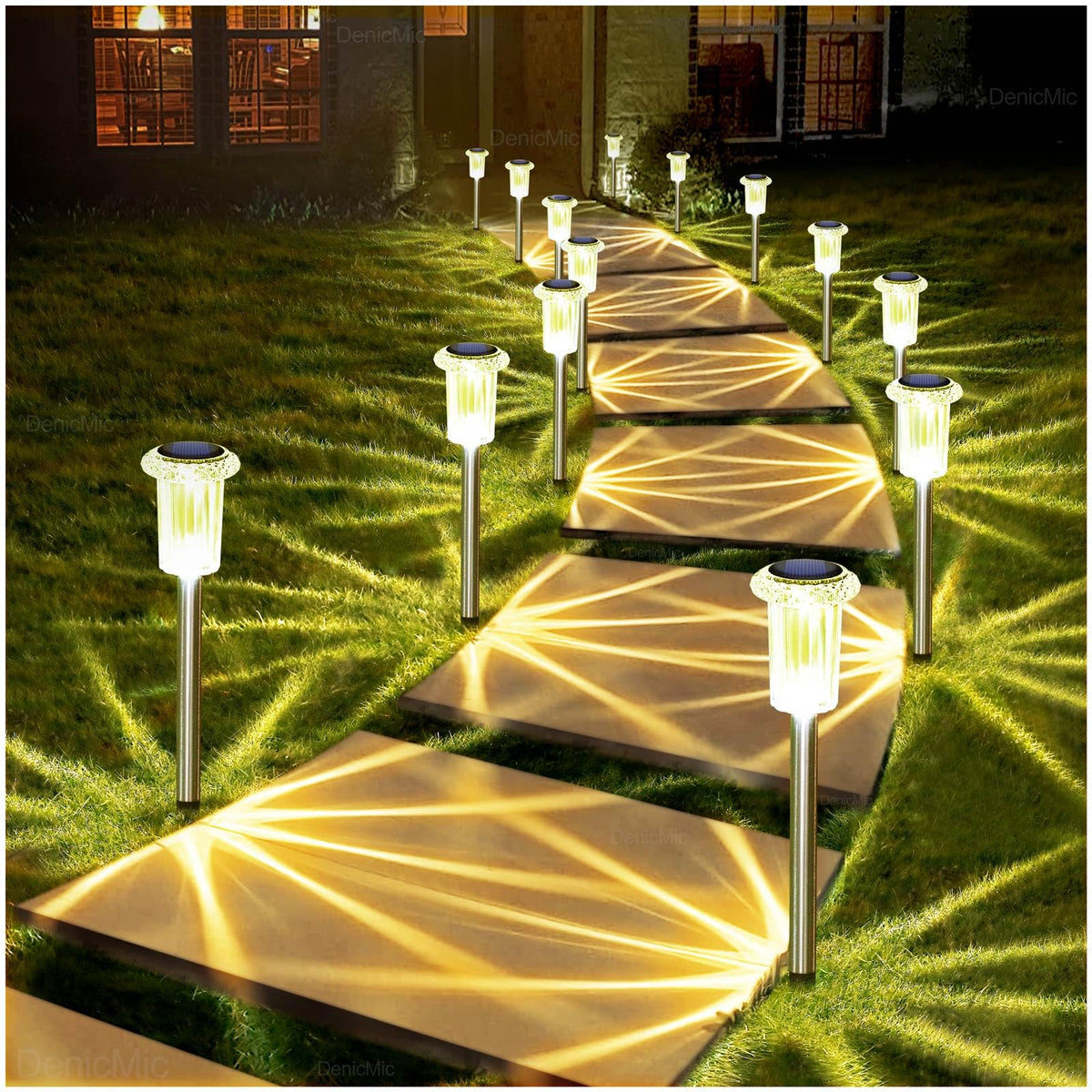 DenicMic solar stake lights with warm white glow illuminate walkways in durable stainless steel.