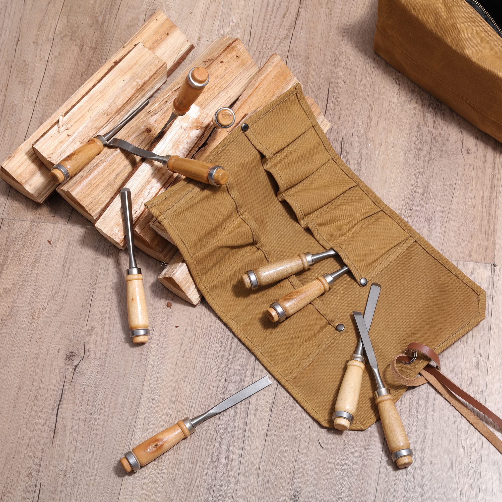 Denifiter Tool Roll in action keeps wrenches and palm tools neatly arranged for fast work.