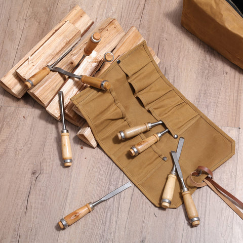 Denifiter Tool Roll in action keeps wrenches and palm tools neatly arranged for fast work.
