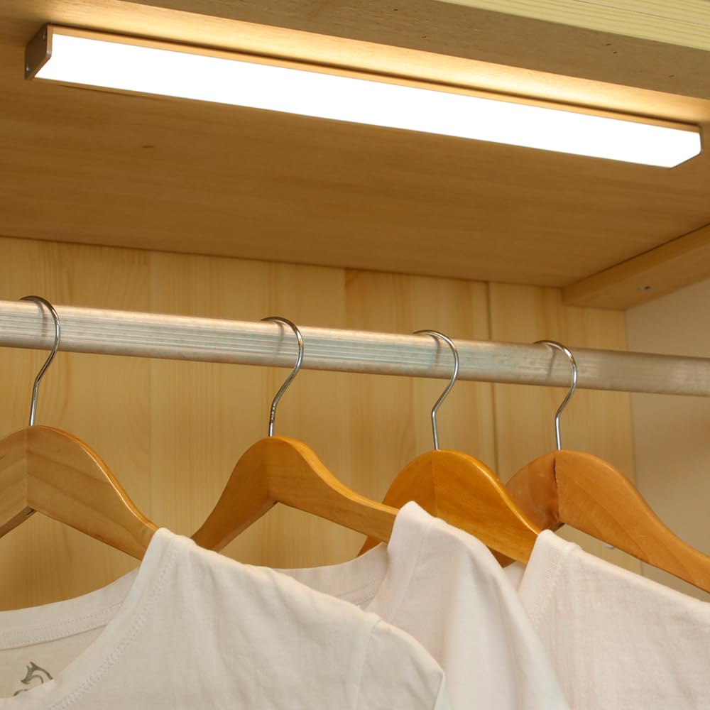 DESUNLUX closet light with motion sensor activated for hands-free wardrobe illumination.