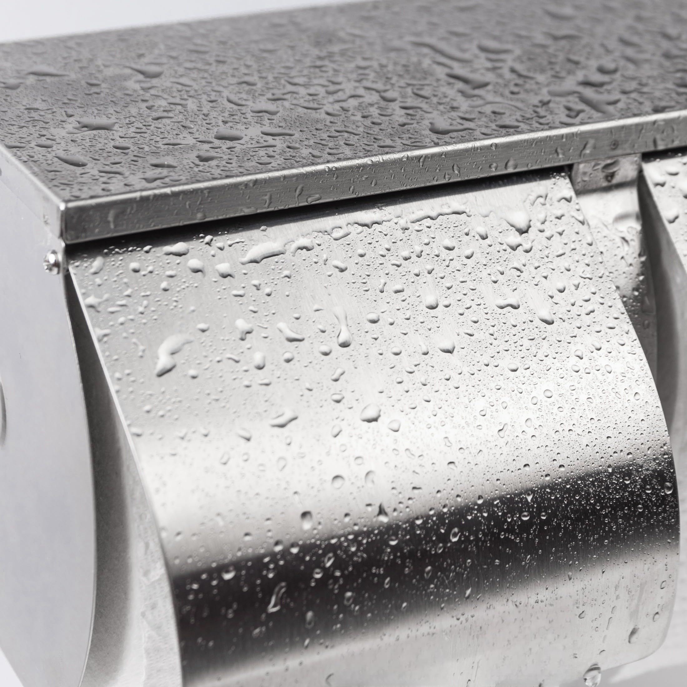 Desyeryamimi toilet paper rolls inside dispenser for quick access.