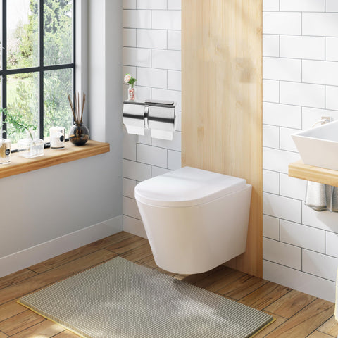 Desyeryamimi two-roll dispenser side view highlights compact wall mounting.
