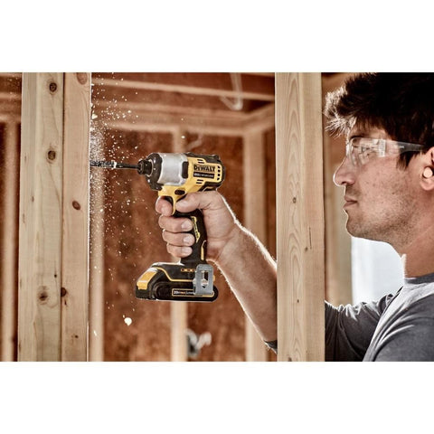 DEWALT 20V MAX impact driver in cabinetry use demonstrates efficient screw driving.