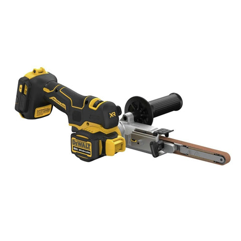 DEWALT DCM200B detail shot on a metal workpiece for precision sanding.