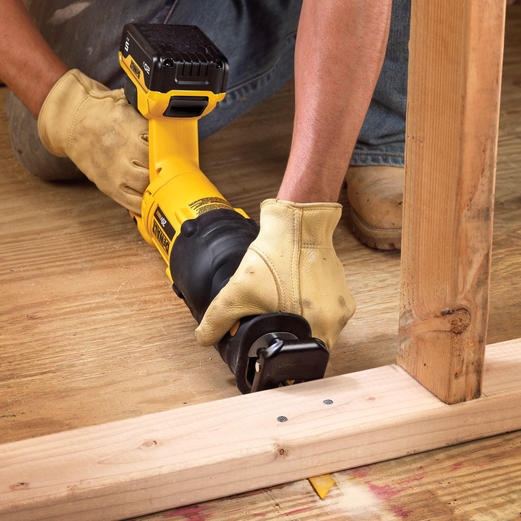 DEWALT DCS380P1 performs flush cuts in tight spaces on site
