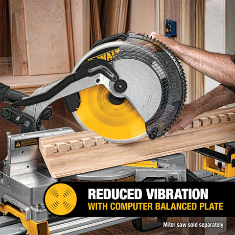 DEWALT computer-balanced plate for smoother cuts.