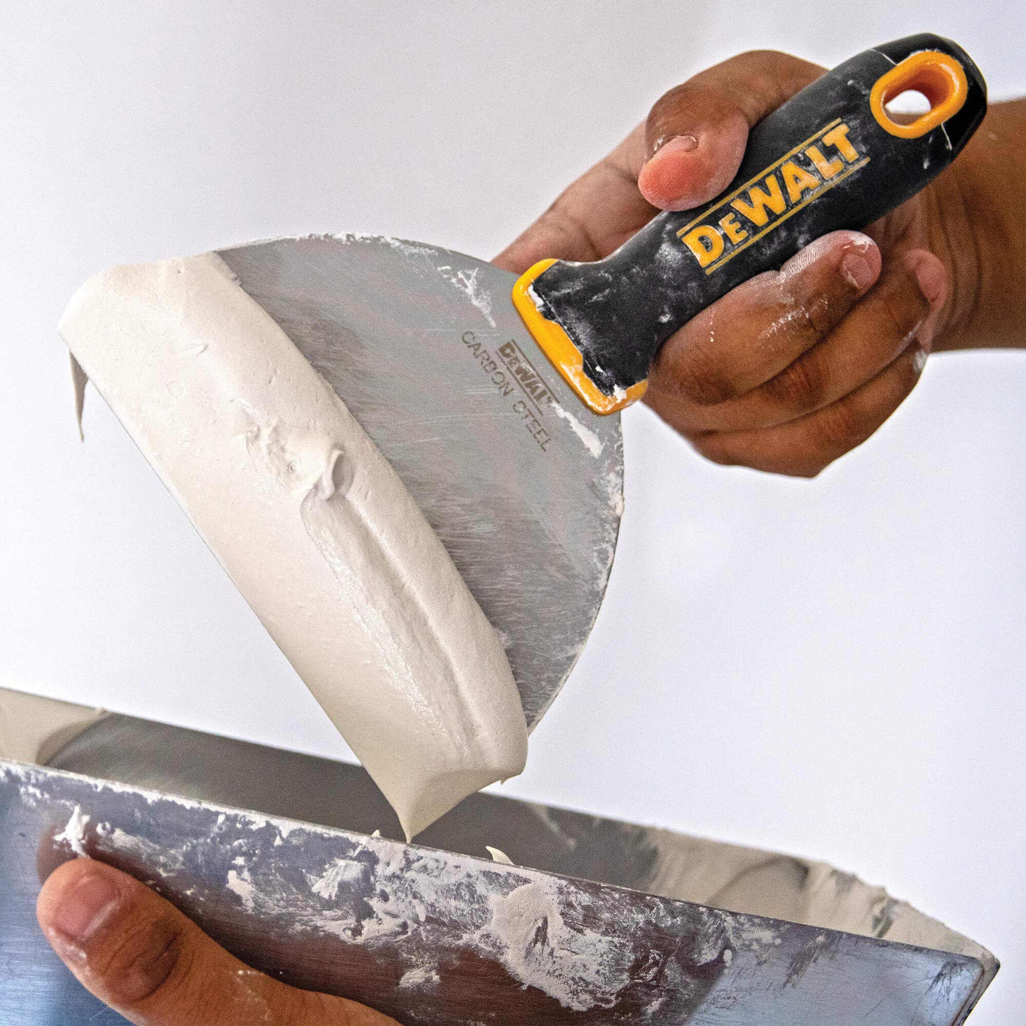 DEWALT putty knife 5-inch soft grip for precise mud application.