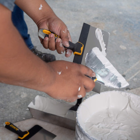 DEWALT putty knife lifetime warranty signals trusted tool durability.