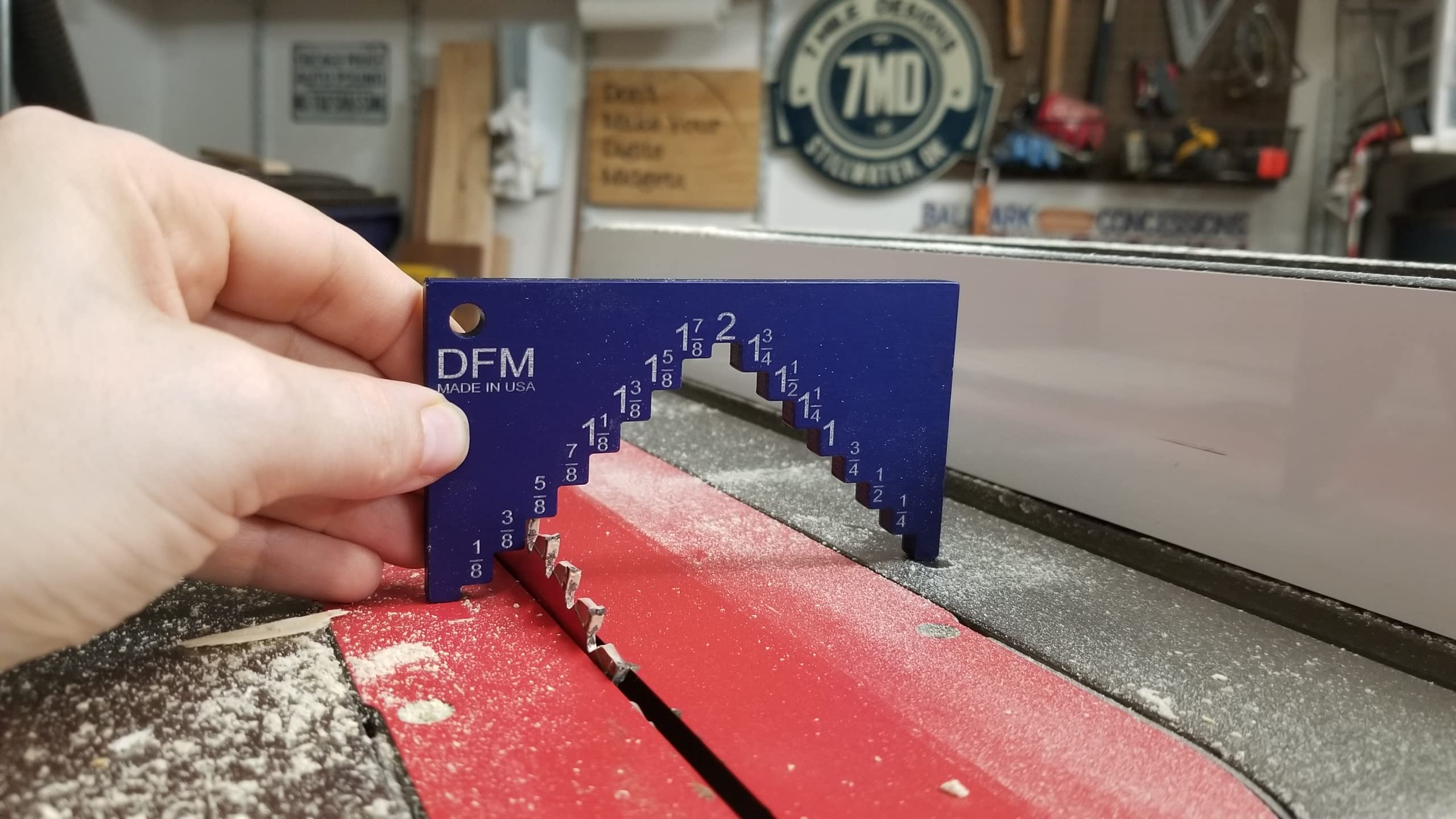 DFM Tool Works gauge in use on a table saw for calibration.