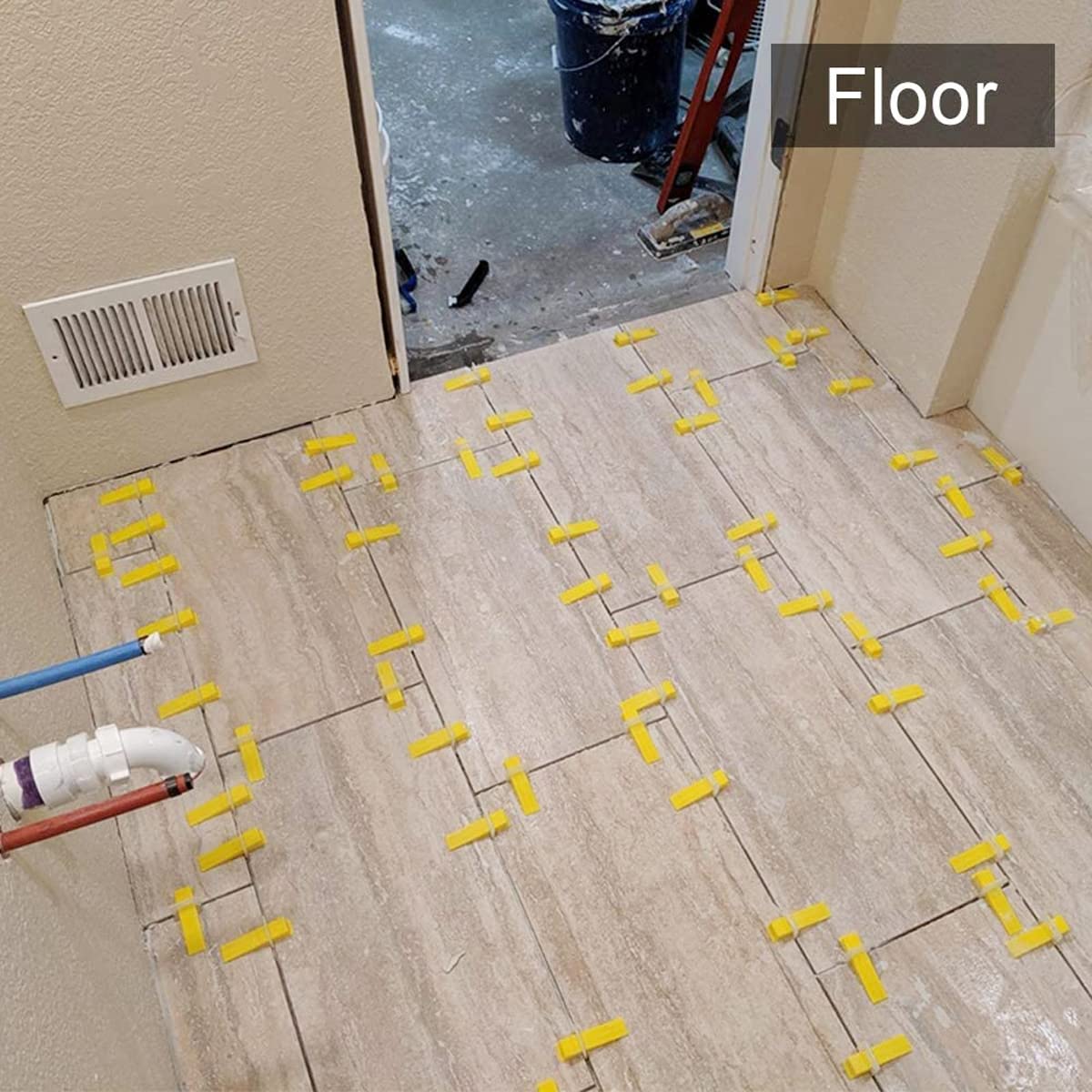 Tiles with flush joints demonstrated on wall or floor using DGSL system
