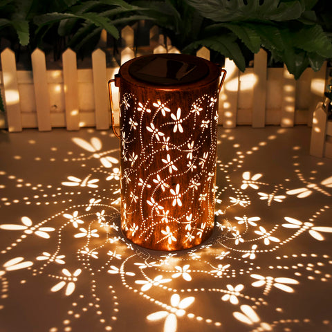 DIBIEECN dragonfly lantern hanging outdoors with warm garden glow.