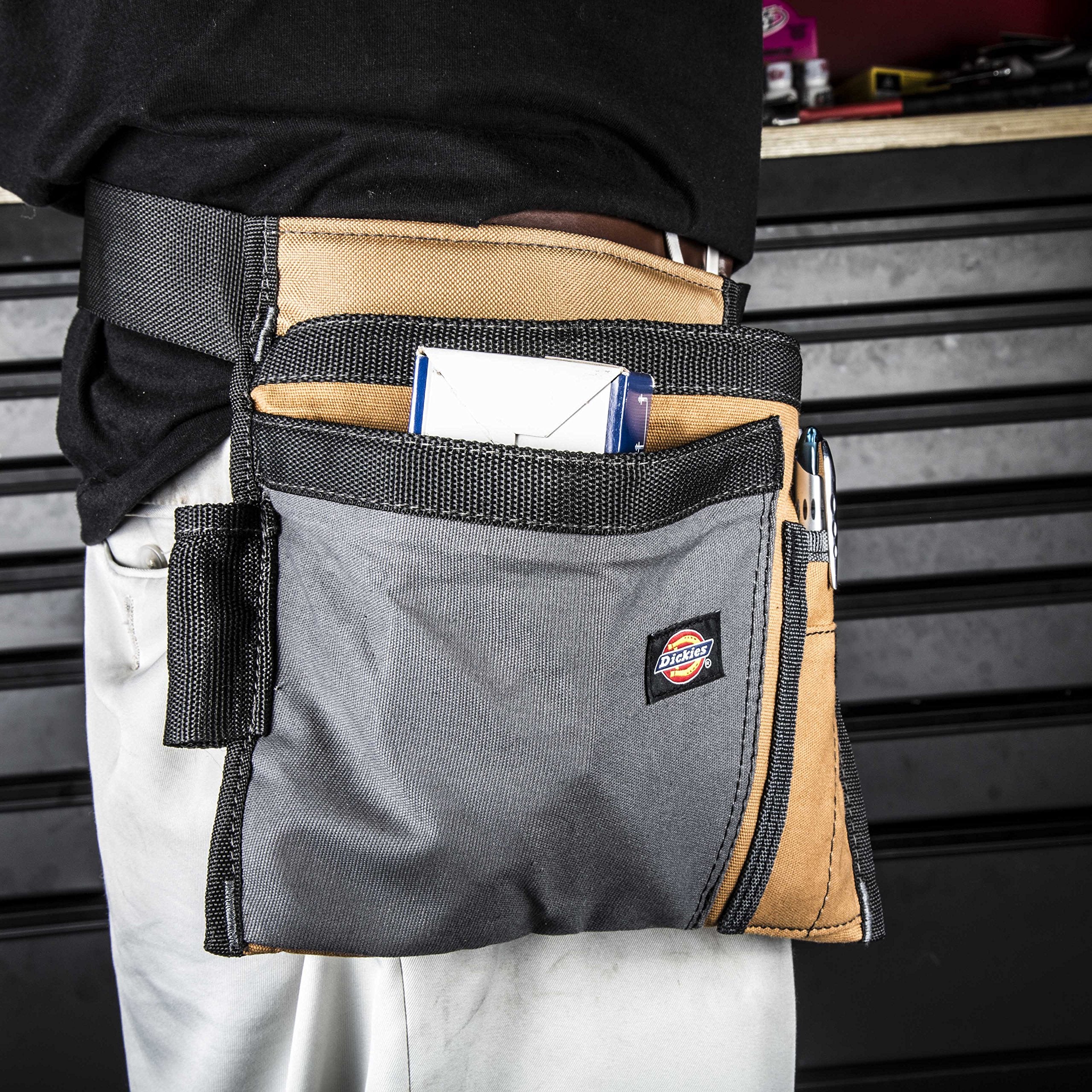 Dickies 57026 adjustable belt fits waists 32–52 inches for customization.