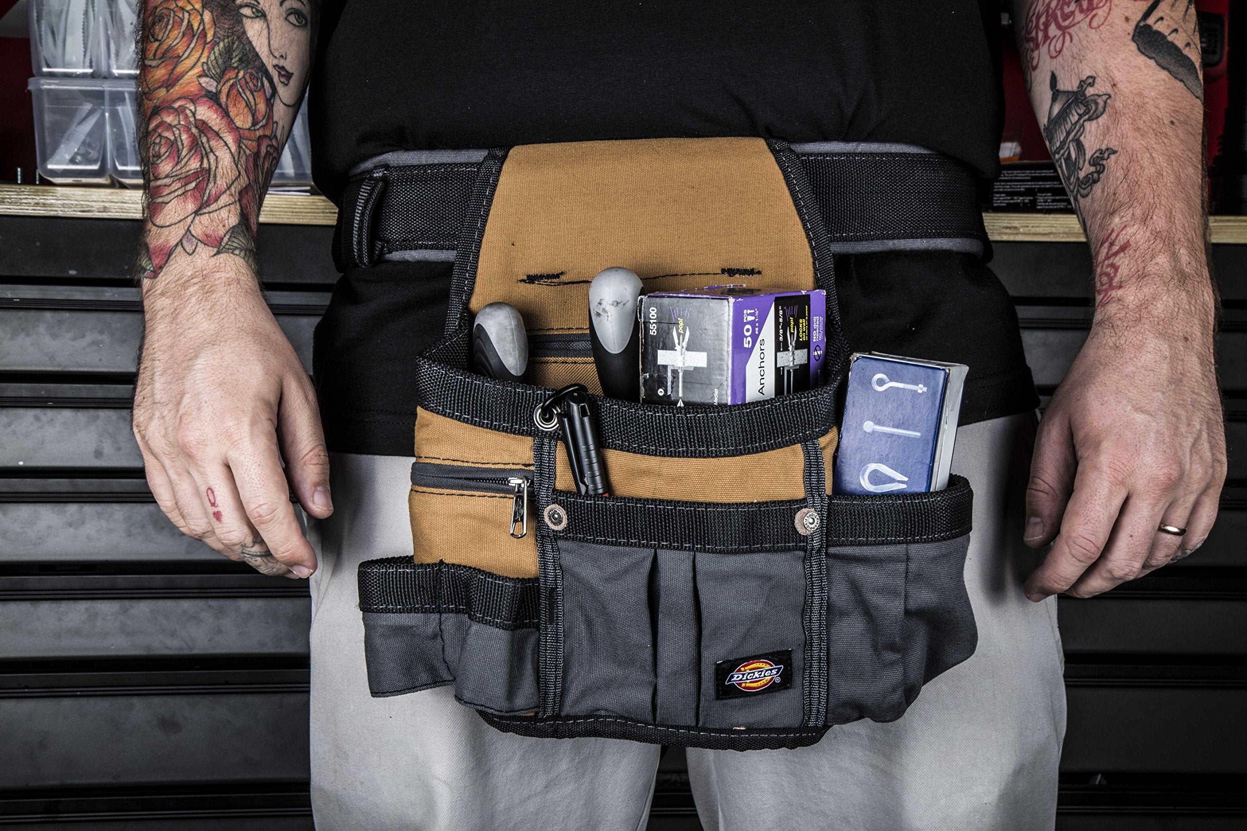Dickies durable canvas construction shown on rugged job site gear