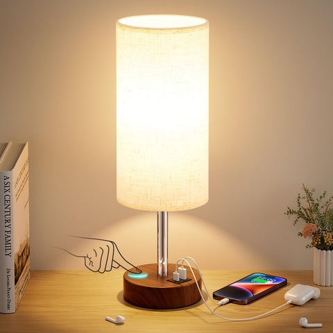 Dicoool nightstand lamp emits soft glow for ambiance.