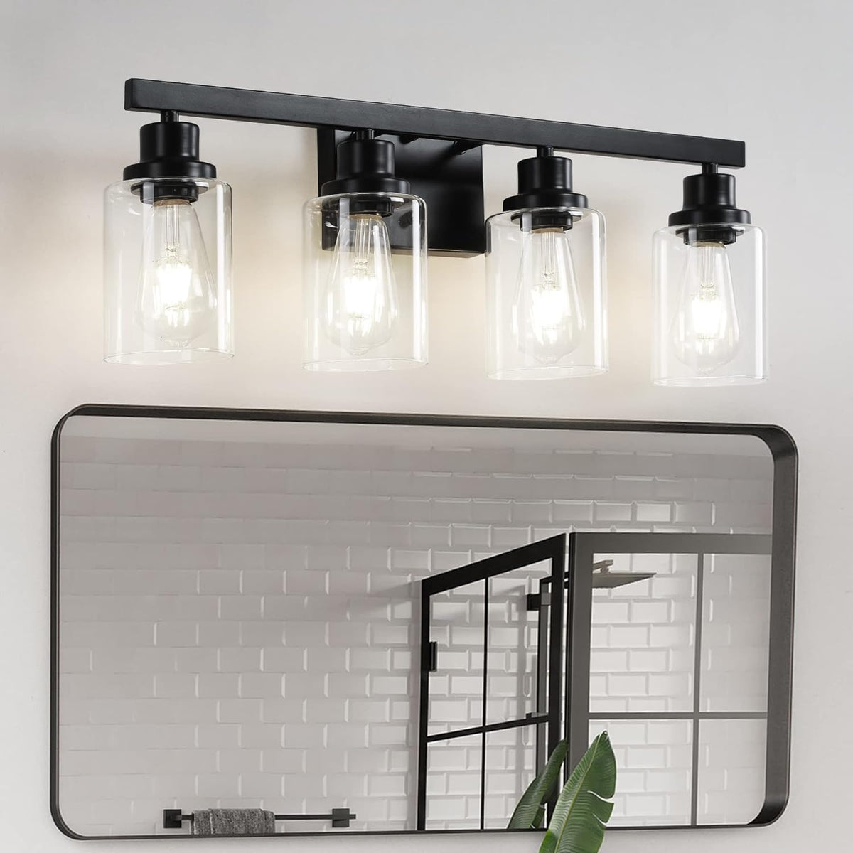 DIKAIDA 4-light vanity light in matte black with clear glass shades for elegance.