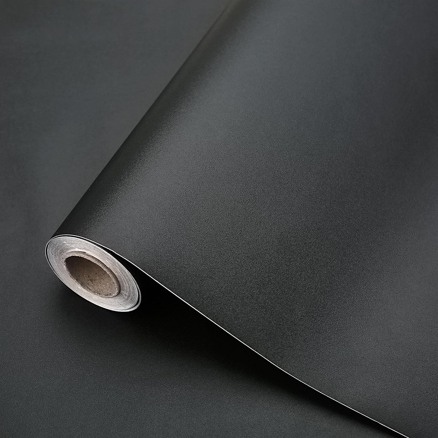 Dimcol black contact paper roll ready for cabinet and countertop updates.