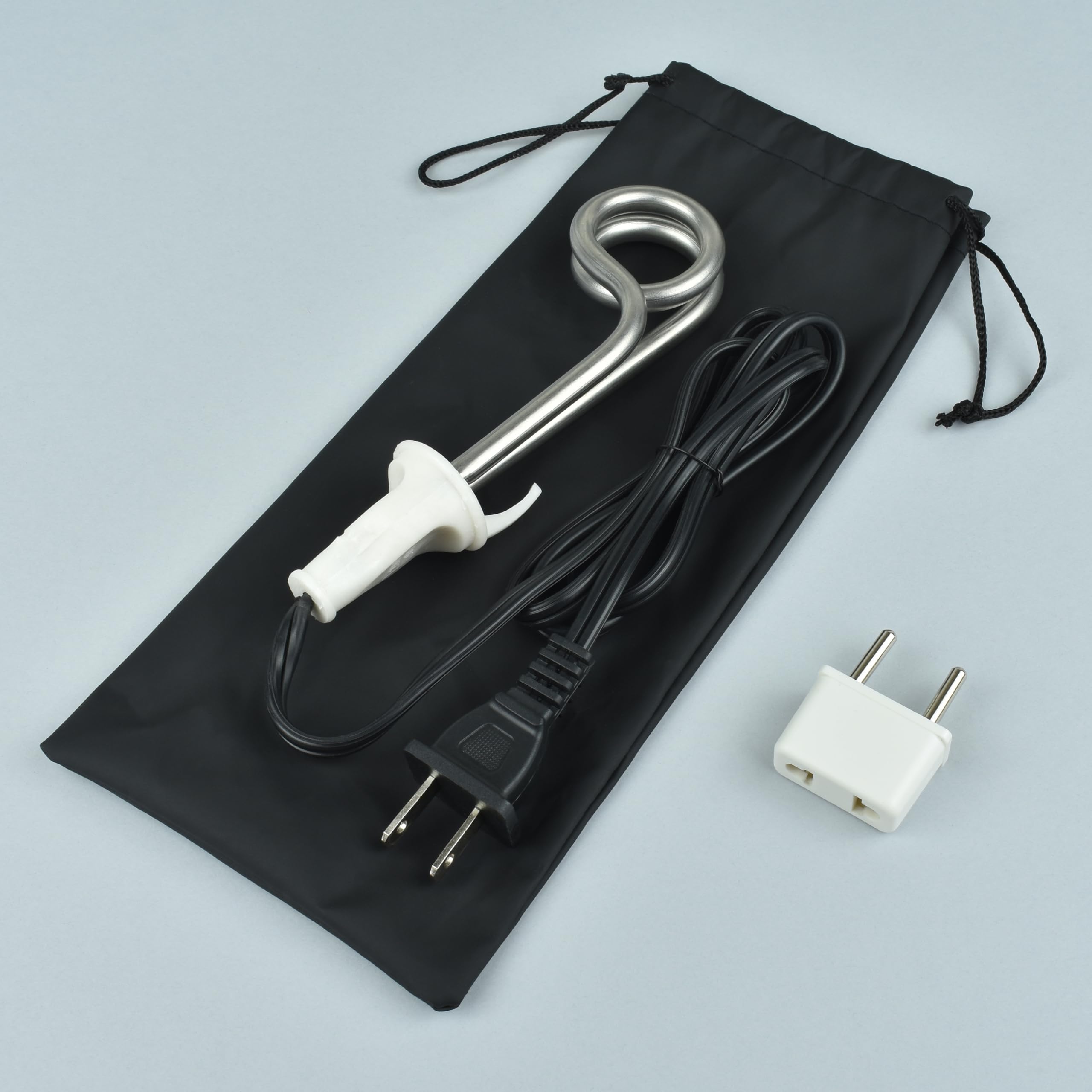 Diximus immersion heater compact design fits travel mugs for quick warming.