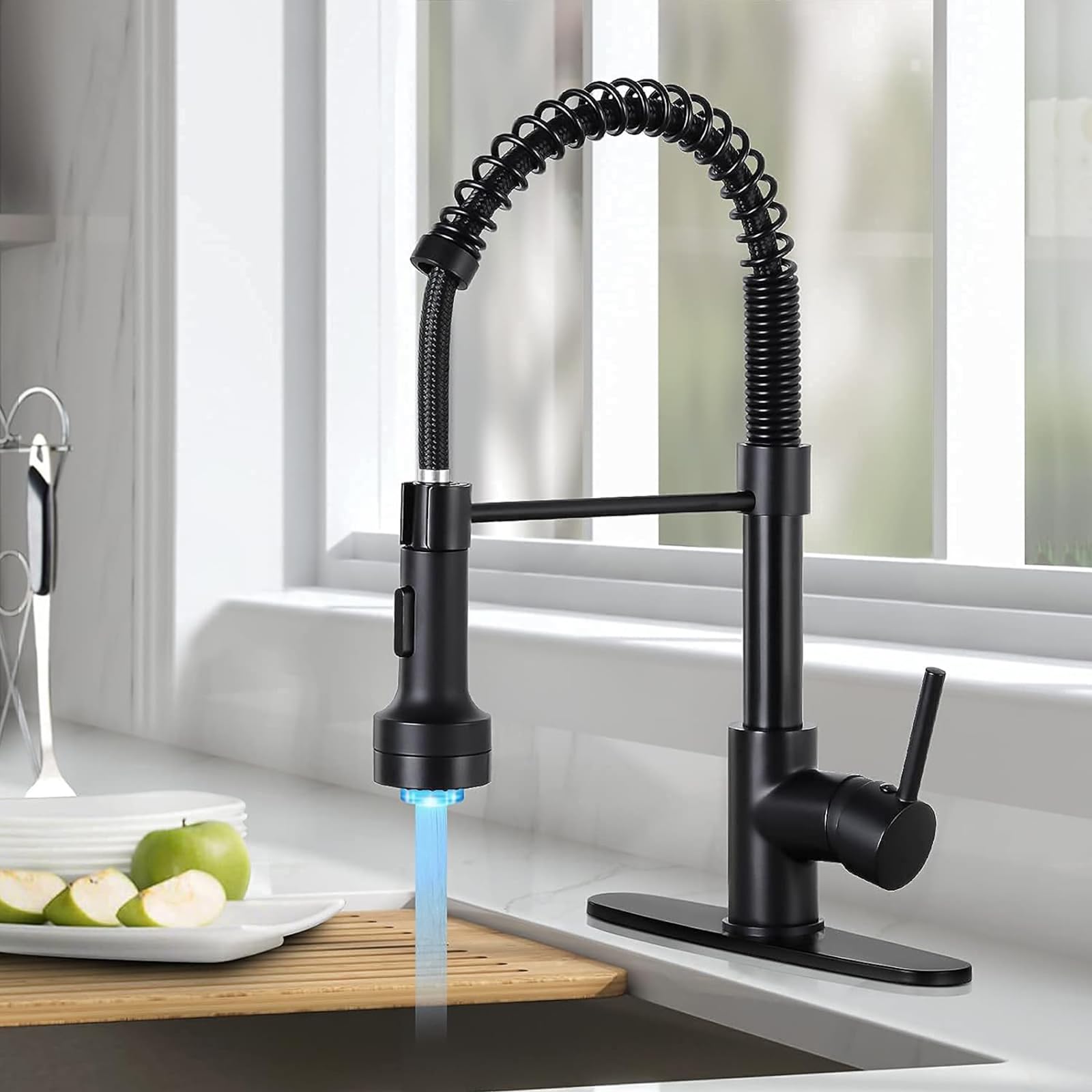 DJS pull-down arc-spring-nozzle offers flexible reach for rinsing large pots.