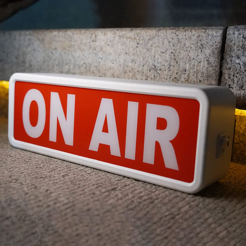 DMKYDM ON AIR sign on a desk setup boosts broadcast clarity