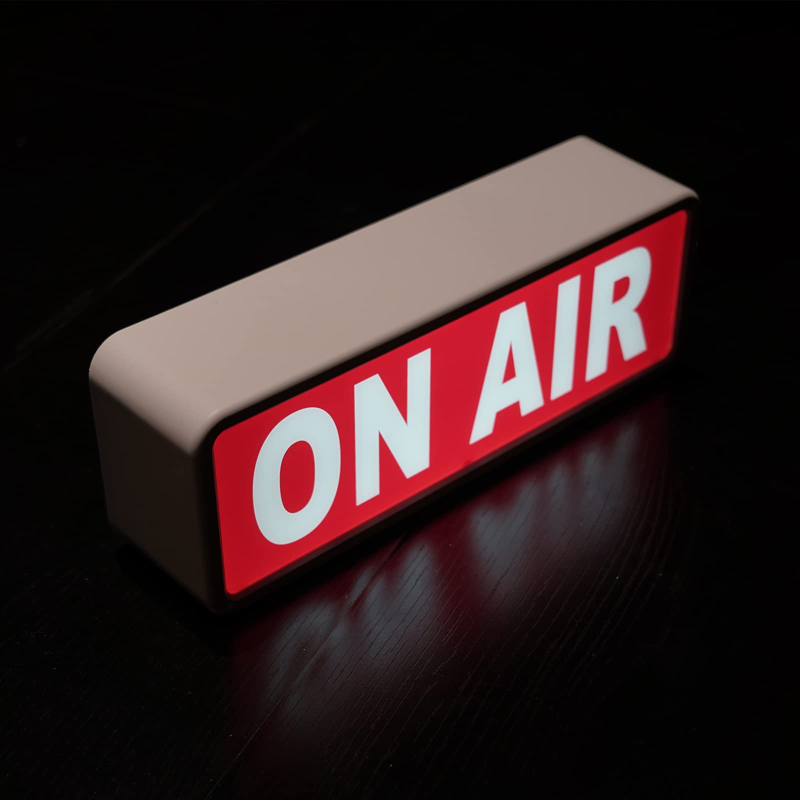 DMKYDM ON AIR sign installed indoors to enhance studio ambience