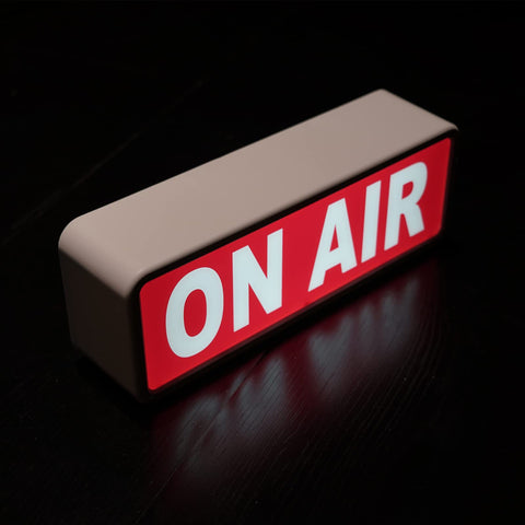 DMKYDM ON AIR sign installed indoors to enhance studio ambience