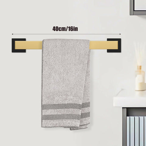 Dorudon atrox toilet paper holder in black gold, compact and sturdy for organized bathrooms.