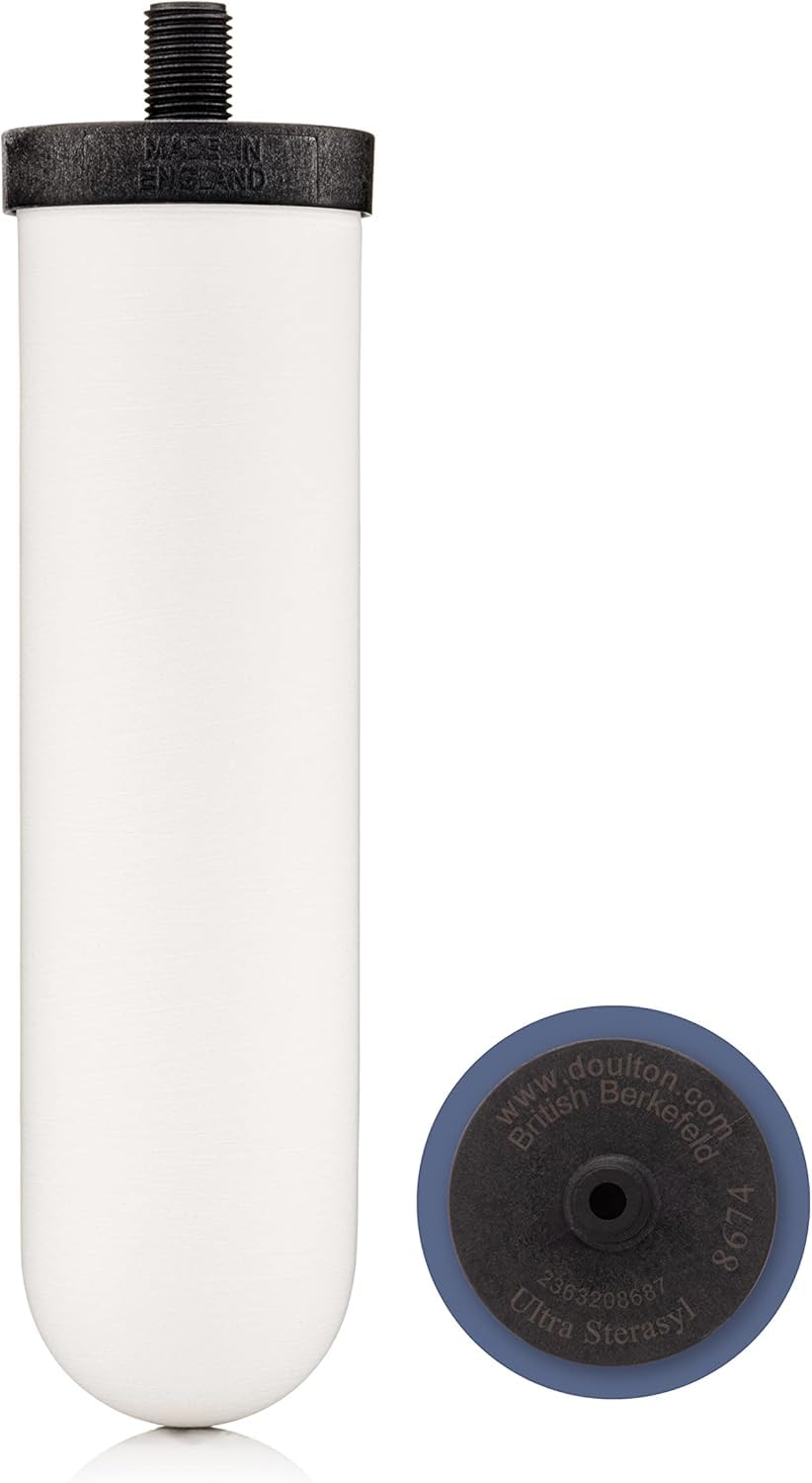 Pouring water from a glass after DOULTON filtration for clarity