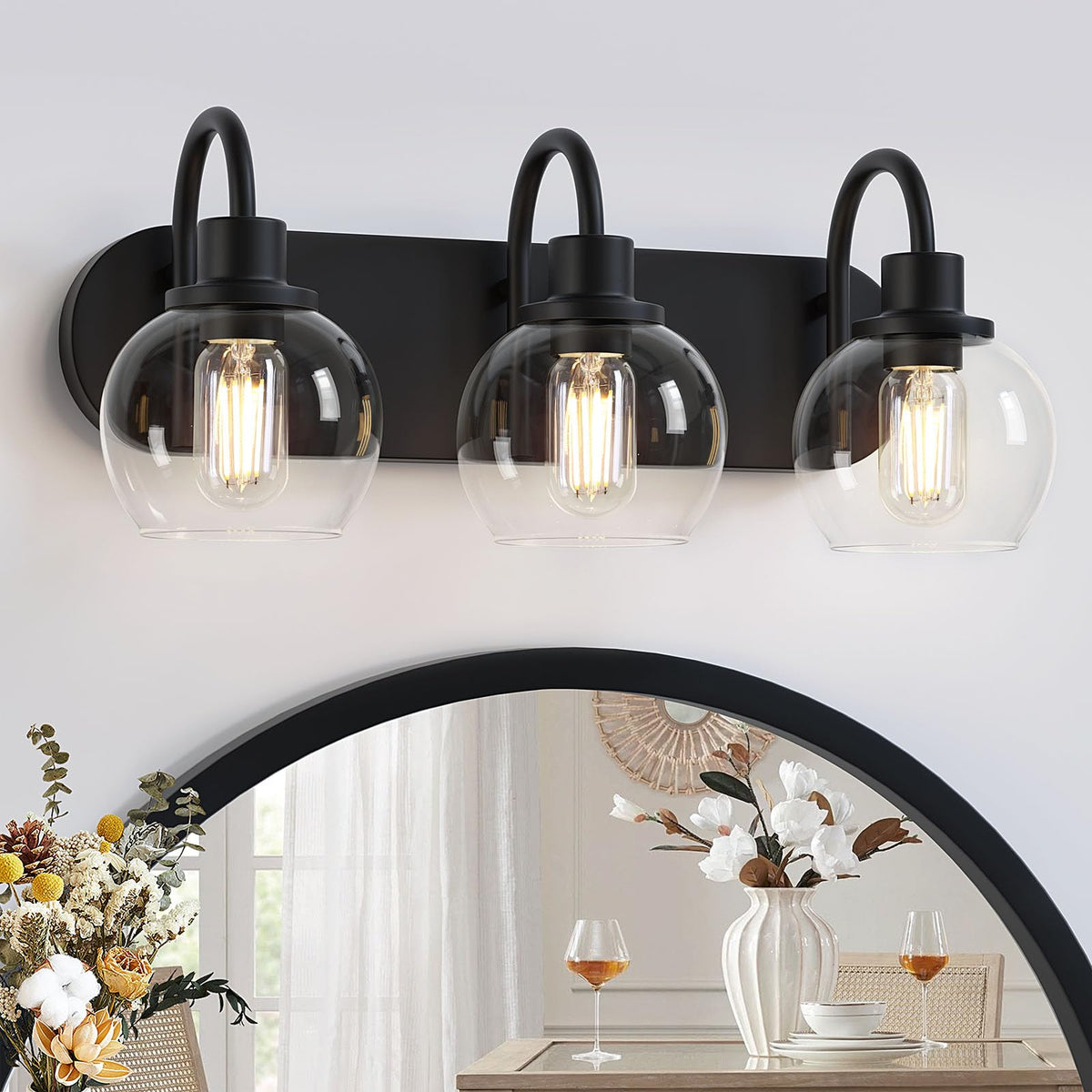 Dpyrrhic three-light vanity fixture with clear glass shades for modern mirror lighting
