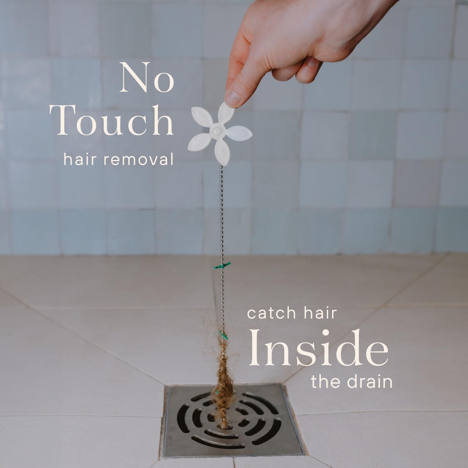DrainWig fits most flat shower drains, helping reduce clogs.