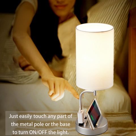 Dreamholder base includes two slots to hold devices while charging.