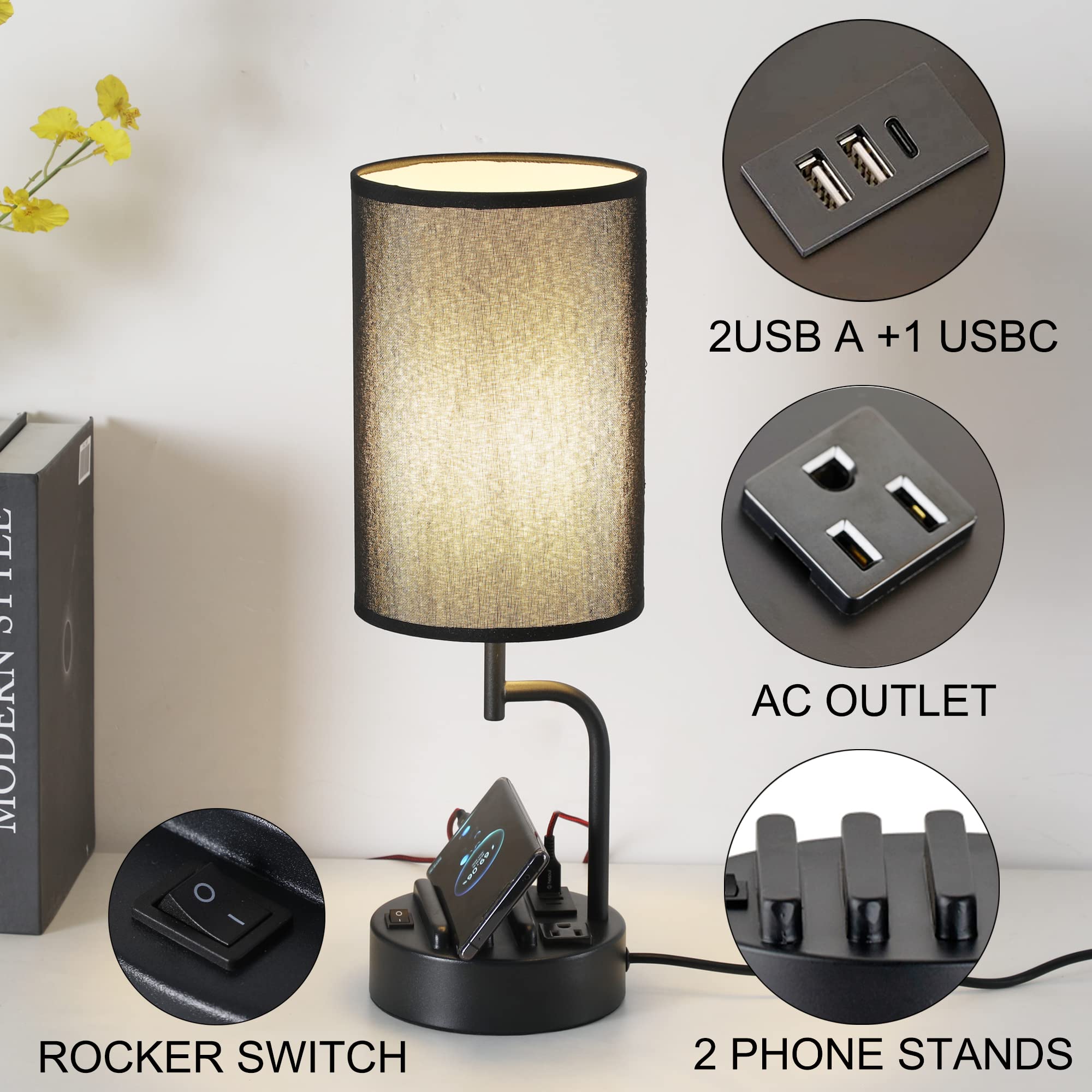 Dreamholder table lamp with black metal base and phone holders to organize bedside devices.