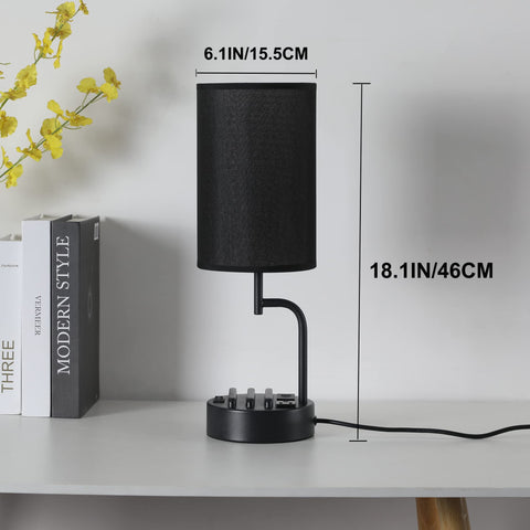 Dreamholder table lamp features two phone holders for easy charging access.