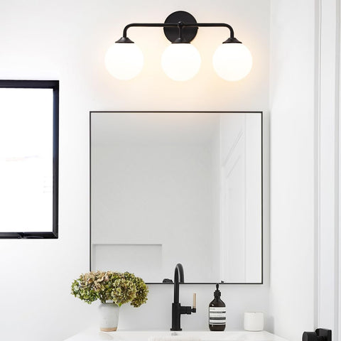 DSMJFU milky white glass shade vanity light enhances warm, inviting bathroom ambiance.
