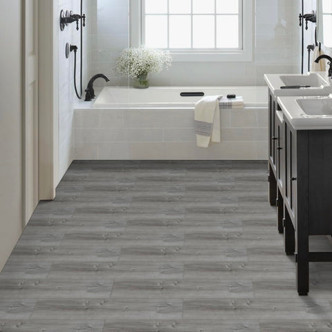 Dureidos waterproof vinyl floor tile demonstrates durable, water-resistant surface