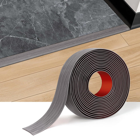 Durteljana gray wood floor-transition strip with plank finish for seamless room transitions and reduced trip hazards.