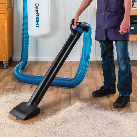 Dust Right removable grate filtering large debris before collection.