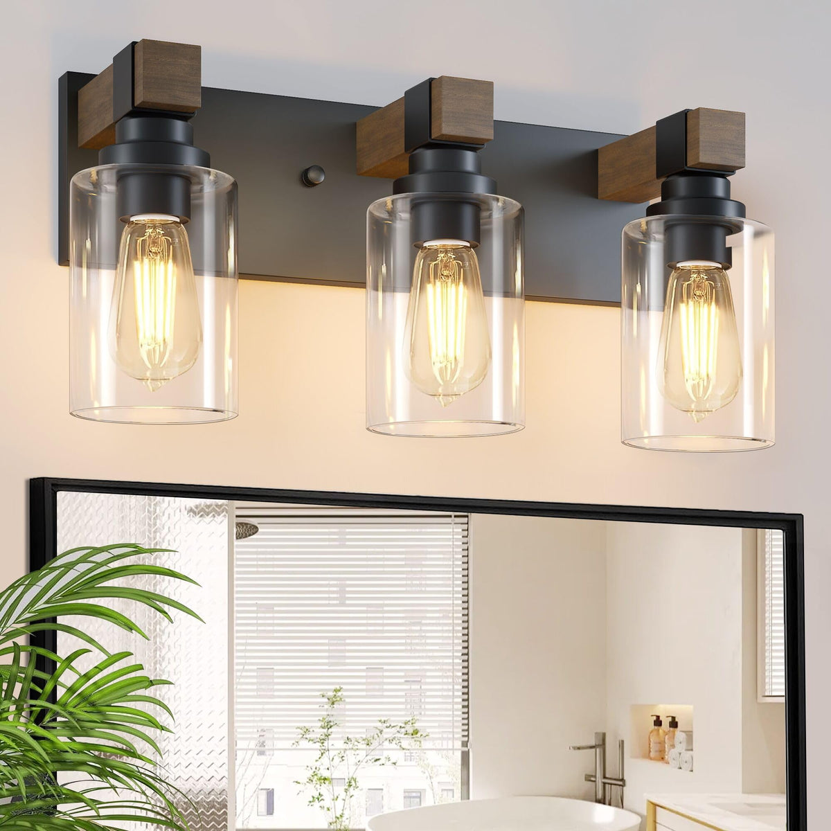 DvmTeom farmhouse wood vanity light with three bulbs above the mirror for warm ambiance.