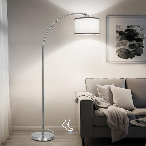 DWTB Silver Arc Floor Lamp with arching arm, ideal for cozy reading corners.