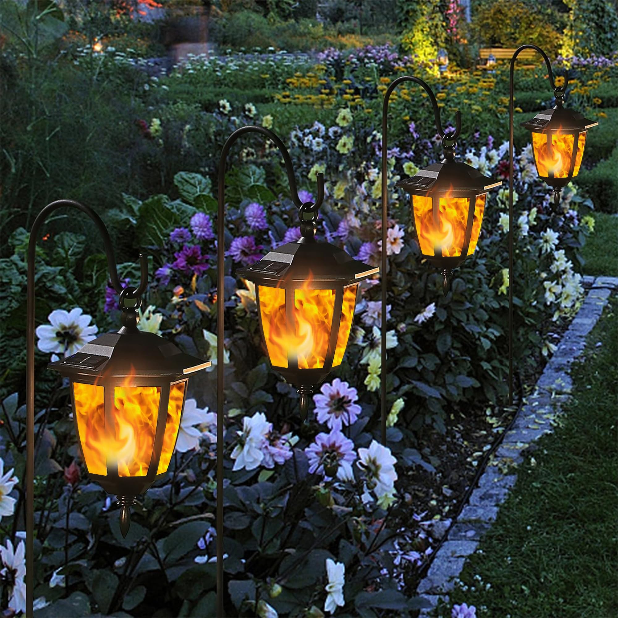 Dynaming flickering flame outdoor light guides paths with subtle glow.