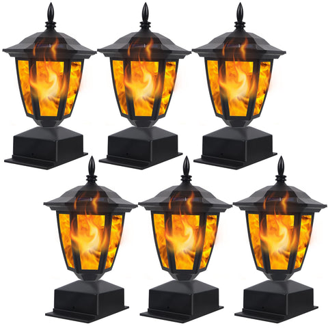Dynaming solar flame post light on a 4x4 cap adds warm ambiance to a fence