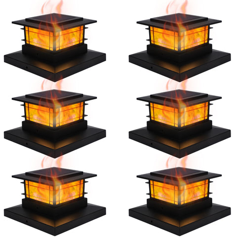Dynaming solar post cap lights with flame close-up showing warm glow