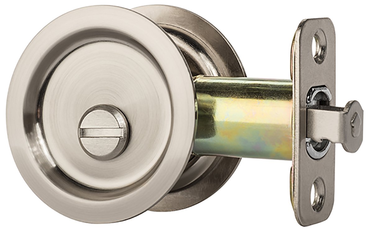 Dynasty Hardware pocket door latch round privacy in use — smooth interior operation.