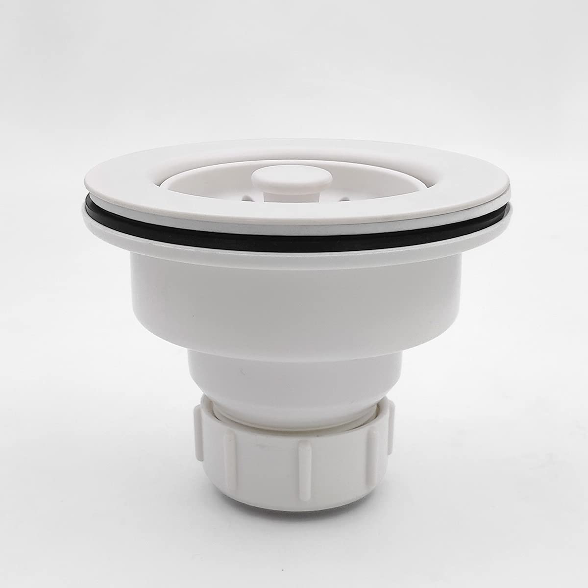 EADOT matte white finish blends with quartz, granite, and stainless steel sinks.
