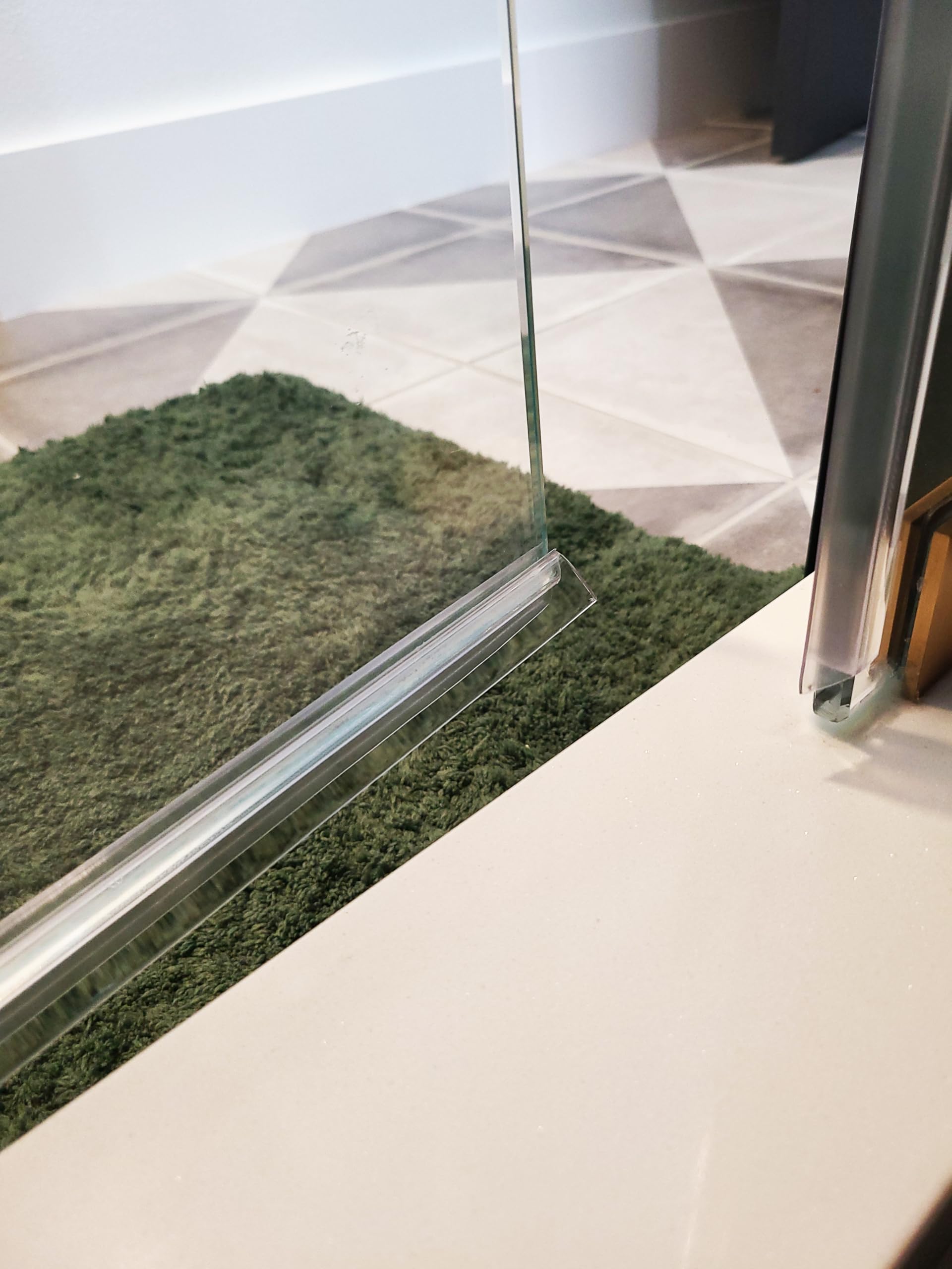 eatelle seal installed on frameless door edge with no adhesive